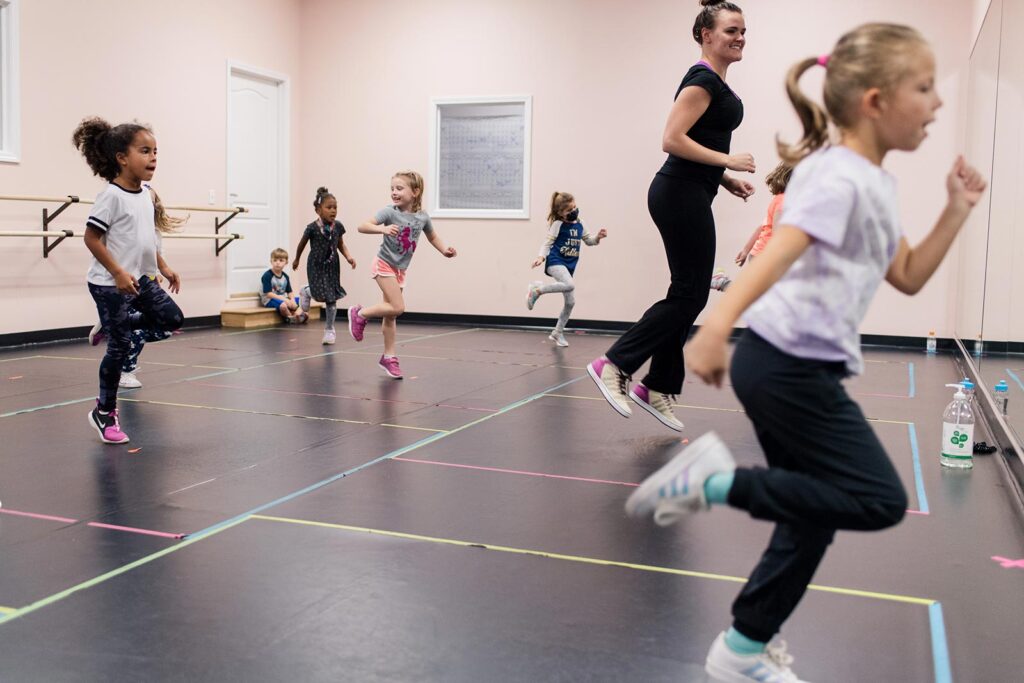 Dance Without Limits | Dance Studio in Greenville, Greer, Taylors area South Carolina | Group of young children dancing with a smiling instructor