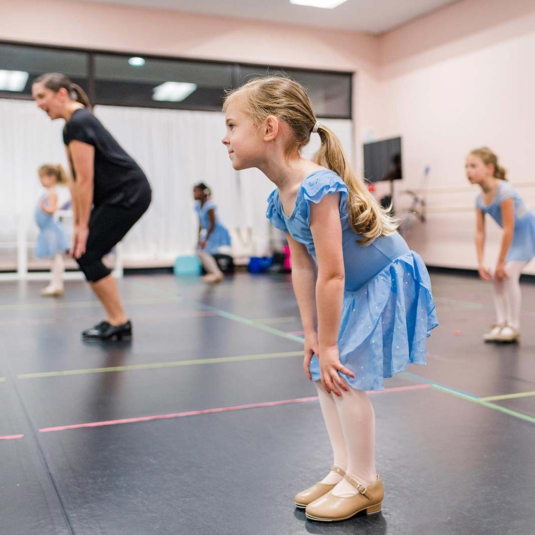 Dance Without Limits | Dance Studio in Greenville, Greer, Taylors area South Carolina | Young girl following teacher instructions in tap class